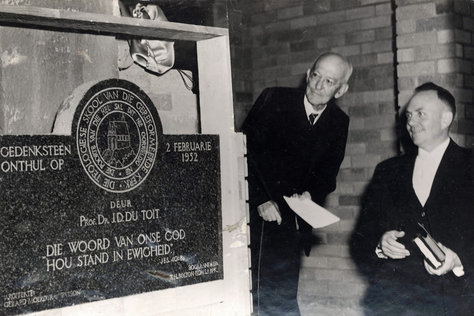 Totius unveils the foundation stone of the new building on 2 February 1952, with Rev. SP van der Walt looking on.
