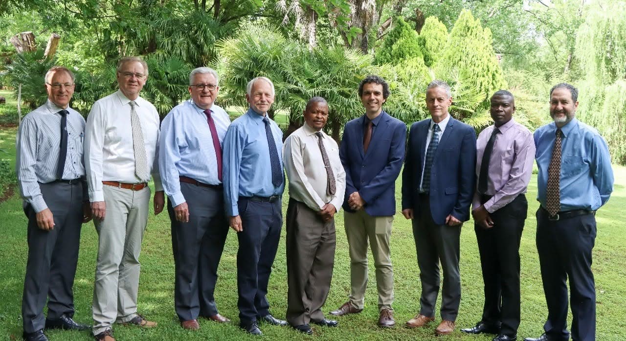 Die professore van die Teologiese Skool. Van links na regs: Chris van der Walt, Francois Viljoen, Naas Ferreira, Henk Stoker, Lekgetho Moretsi, Albert Coetsee, Sarel van der Walt, Risimati Hobyane en Francois Muller.